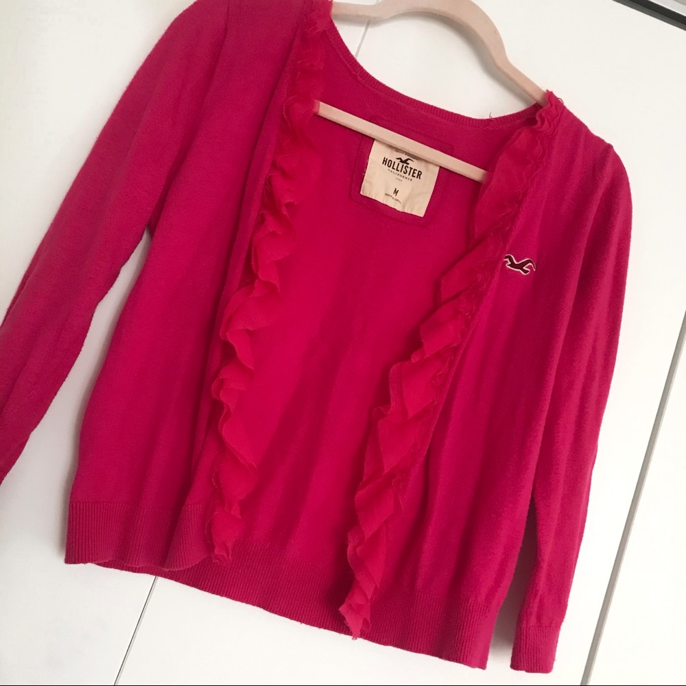 Pink frilly cardigan
